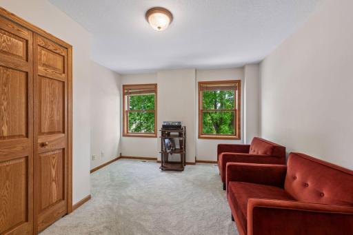One of three upper level bedrooms, currently used as a media room.