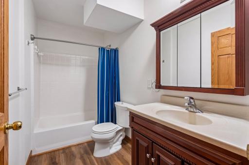 A full bathroom is shared by the bedrooms.