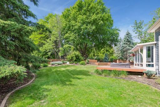 Beautiful lush lawn. Mature trees offer shade and gorgeous fall colors.