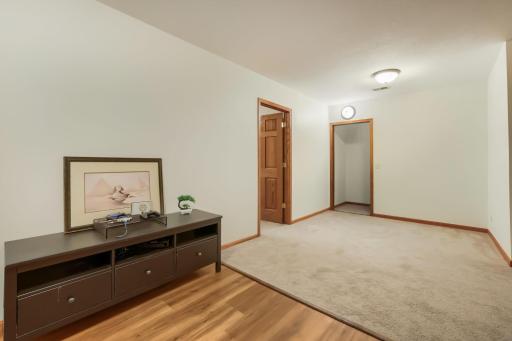 The basement has so much room to spread out - room at the base of the stairs for a reading nook, or just a table and convenient place for shoes, keys, etc.