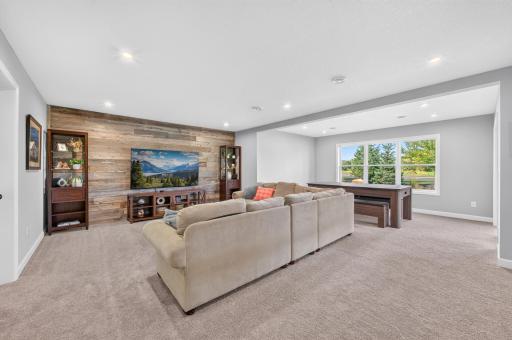 Lower-Level Recreation Space Perfect for Movie Nights and Family Gatherings.