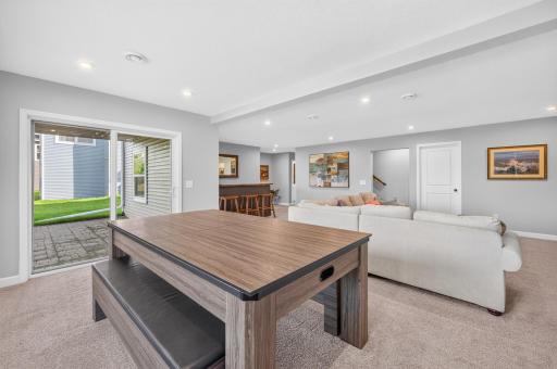 Gaming Table (Can Stay with the Home) with Walk-Out to Paver Patio.