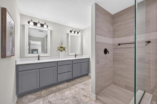 Spa-Like Primary Bathroom with Double Vanity and Modern Finishes. Oversized Walk-In Tiled Shower