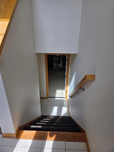 Front entry to garage, storage area, laundry room and mechanicals