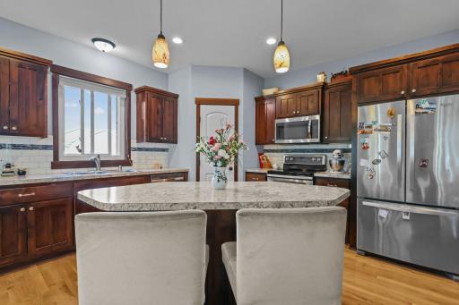 Kitchen with center island and SS appliances.JPG