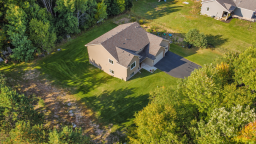 4992 235th Aerial 1.27 acres with large established garden along the garage.png