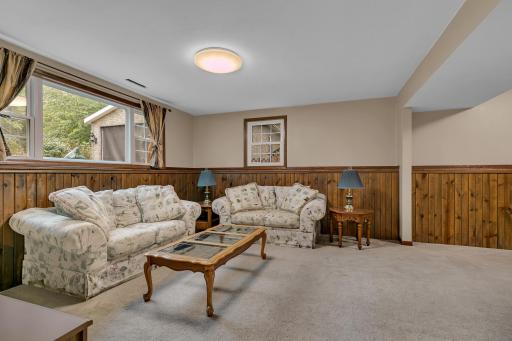 Major mechanical updates include a high-efficiency furnace, central AC, and gas water heater (2017), plus there is a 200-amp electrical panel.