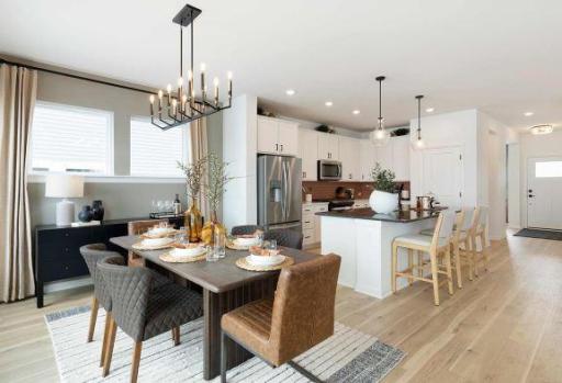 Staged Dining Room and Kitchen-similar home