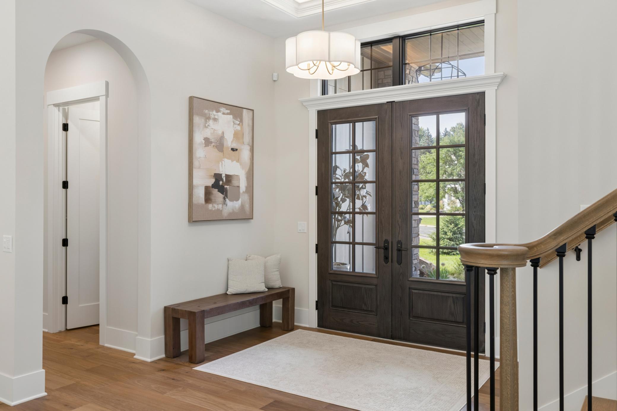 Spacious Foyer with ceiling detail and accent lighting