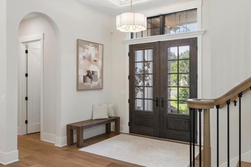 Spacious Foyer with ceiling detail and accent lighting
