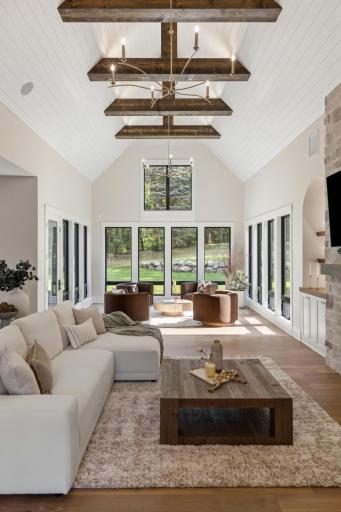 Grand ceilings with beams and accent lighting