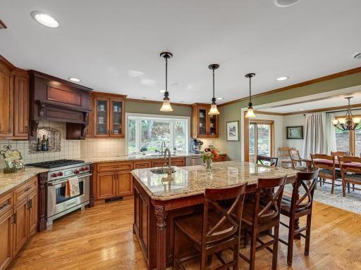 WOW! A picture says a 1000 words but this is truly a Chefs Dream Kitchen and perfect for entertaining! Open layout to large formal dining room.