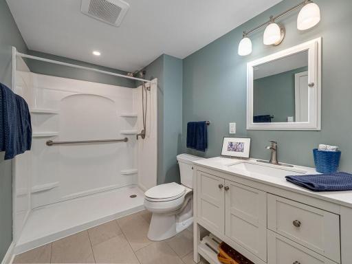 Recently updated lower level bathroom with heated tile floor!