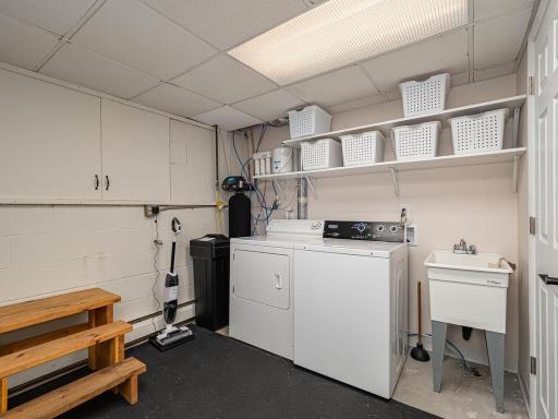 Lower level laundry room and storage. Maytag washer/dryer included .
