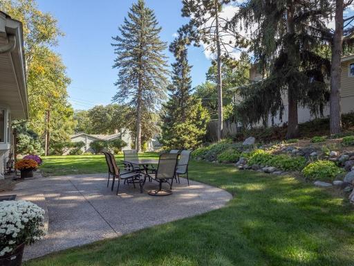 Private backyard patio and professionally landscaped gardens!