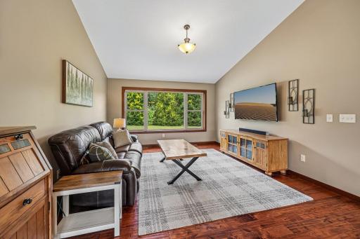 Living room with vaulted ceiings - birch floors