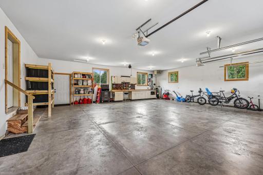 34 x 32 Finished, insulated, heated garage with hot/cold water and wired 220