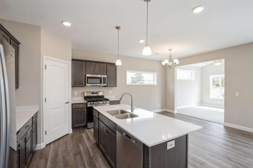 Kitchen - photos are of a completed inventory home of the same floorplan. Colors and selections may differ.