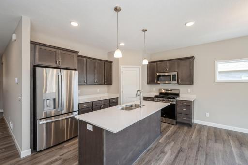 Kitchen - photos are of a completed inventory home of the same floorplan. Colors and selections may differ.