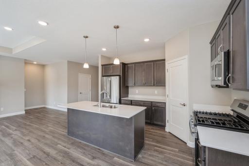 Kitchen - photos are of a completed inventory home of the same floorplan. Colors and selections may differ.