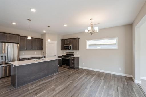 Dining area - photos are of a completed inventory home of the same floorplan. Colors and selections may differ.