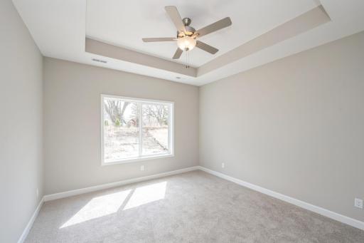Primary suite - photos are of a completed inventory home of the same floorplan. Colors and selections may differ.
