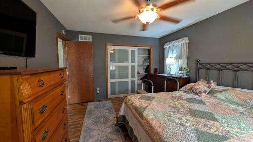 Owner's Suite with Modern Sliding Closet Doors