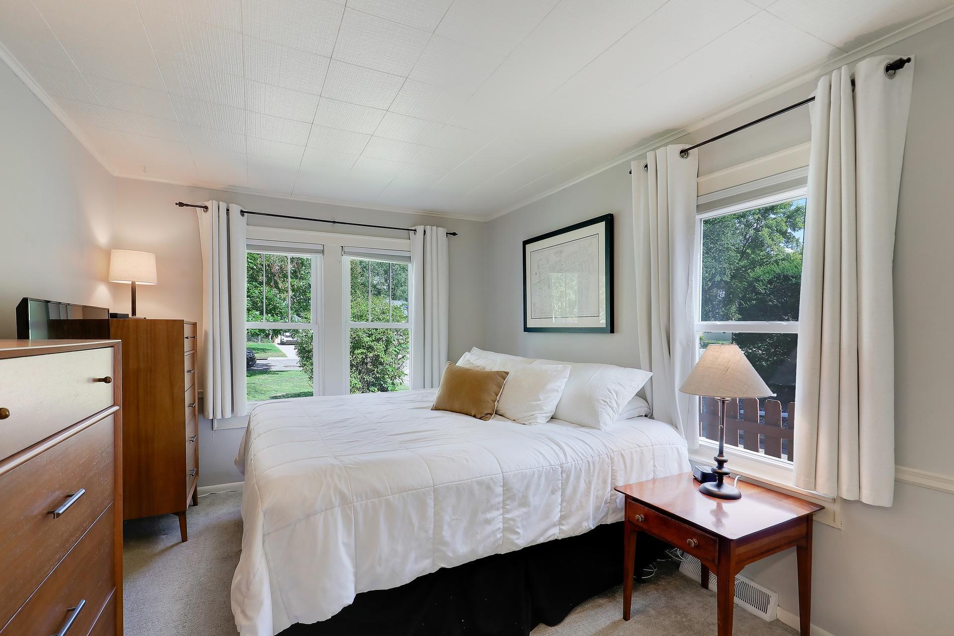 The primary bedroom can accommodate a king size bed and still have space for dressers and storage.