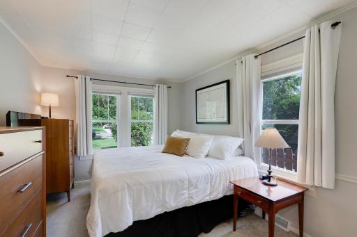 The primary bedroom can accommodate a king size bed and still have space for dressers and storage.