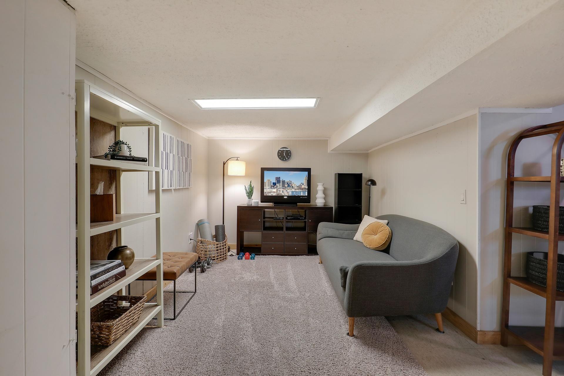 Lower level has an awesome space for entertaining or just chilling.