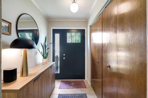 Spacious entry way with full wall closet for plenty of storage.