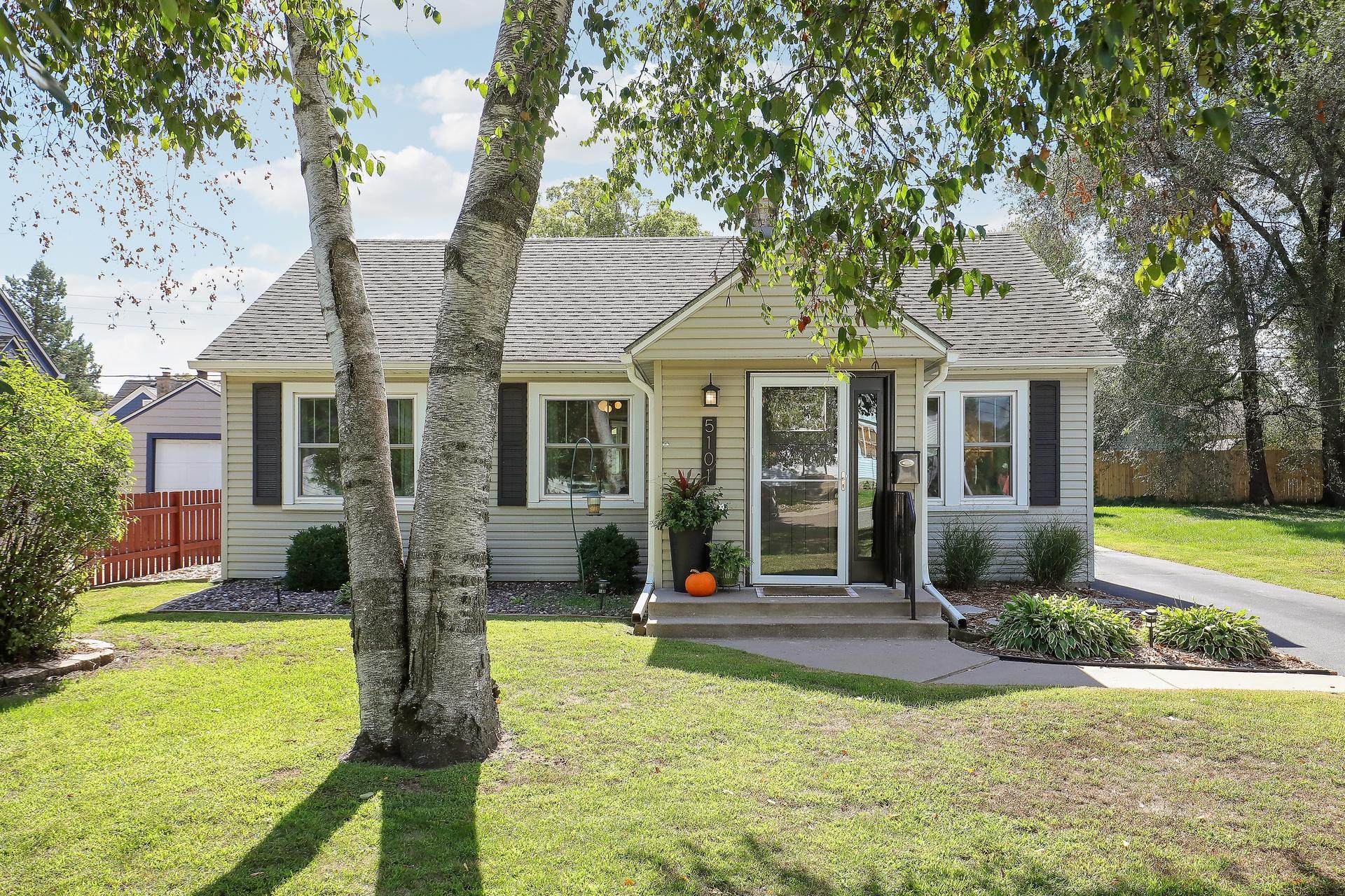 Charming curb appeal where pride of ownership shines brightly!