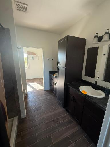 Master Bathroom: Dual Sinks & Entrance to Walk-in Closet
