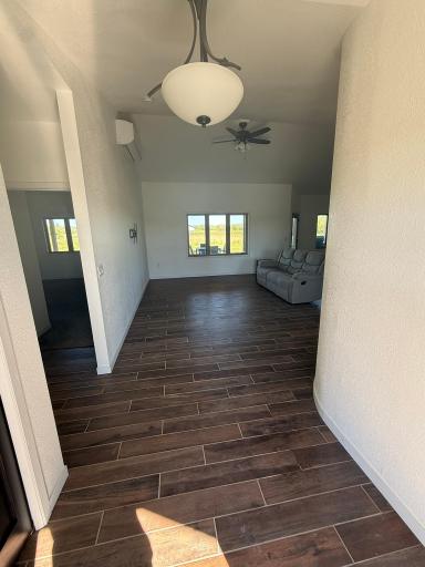 Entryway leading into Living Room, Master to the left