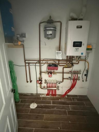 Mechanical Room off Garage : In Floor Heat / Boiler