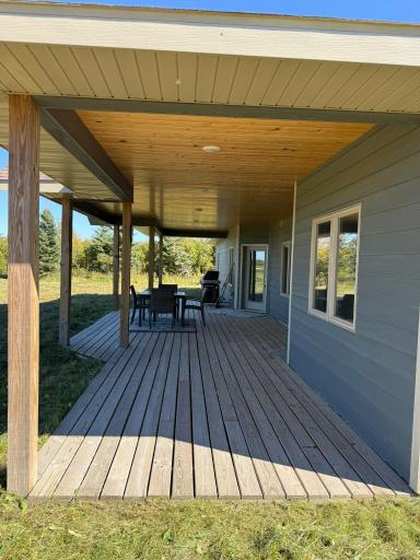 Exterior: Covered Porch with Wood Deck