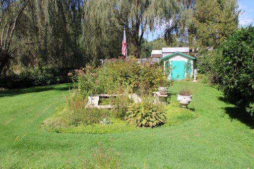 Koi pond and shed.JPG