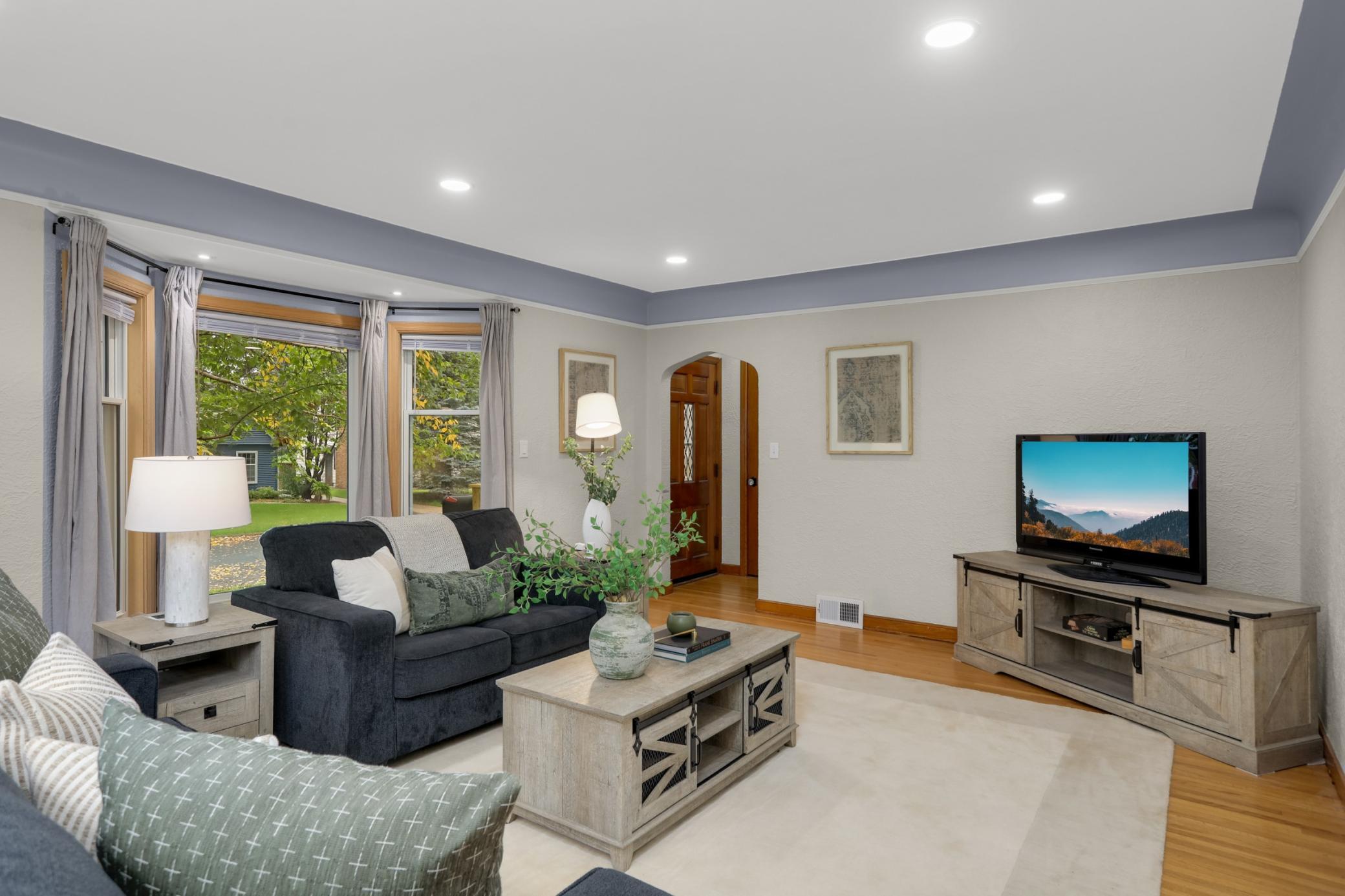 Bright, welcoming living room with plenty of space to relax and unwind