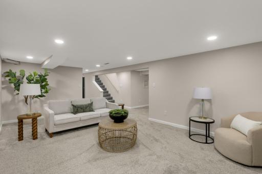 Spacious family room perfect for relaxing, entertaining, or movie nights