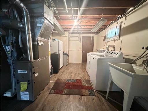 Utility room leads to the attached garage