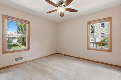 Second Main Floor Bedroom with new carpet and hardwood floors underneath