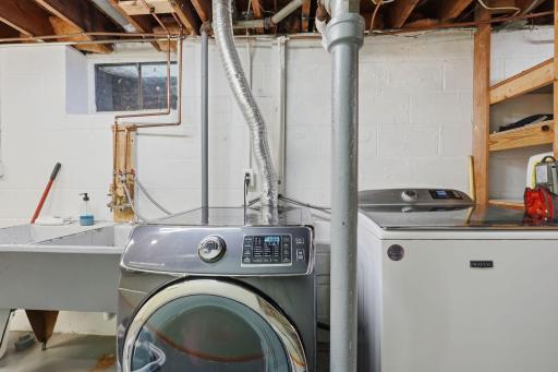 Newer Washer and Dryer and large laundry tub!