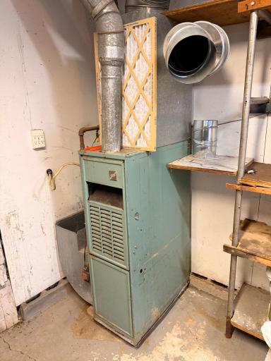 Furnace in Garage was just serviced and in good working order.jpeg