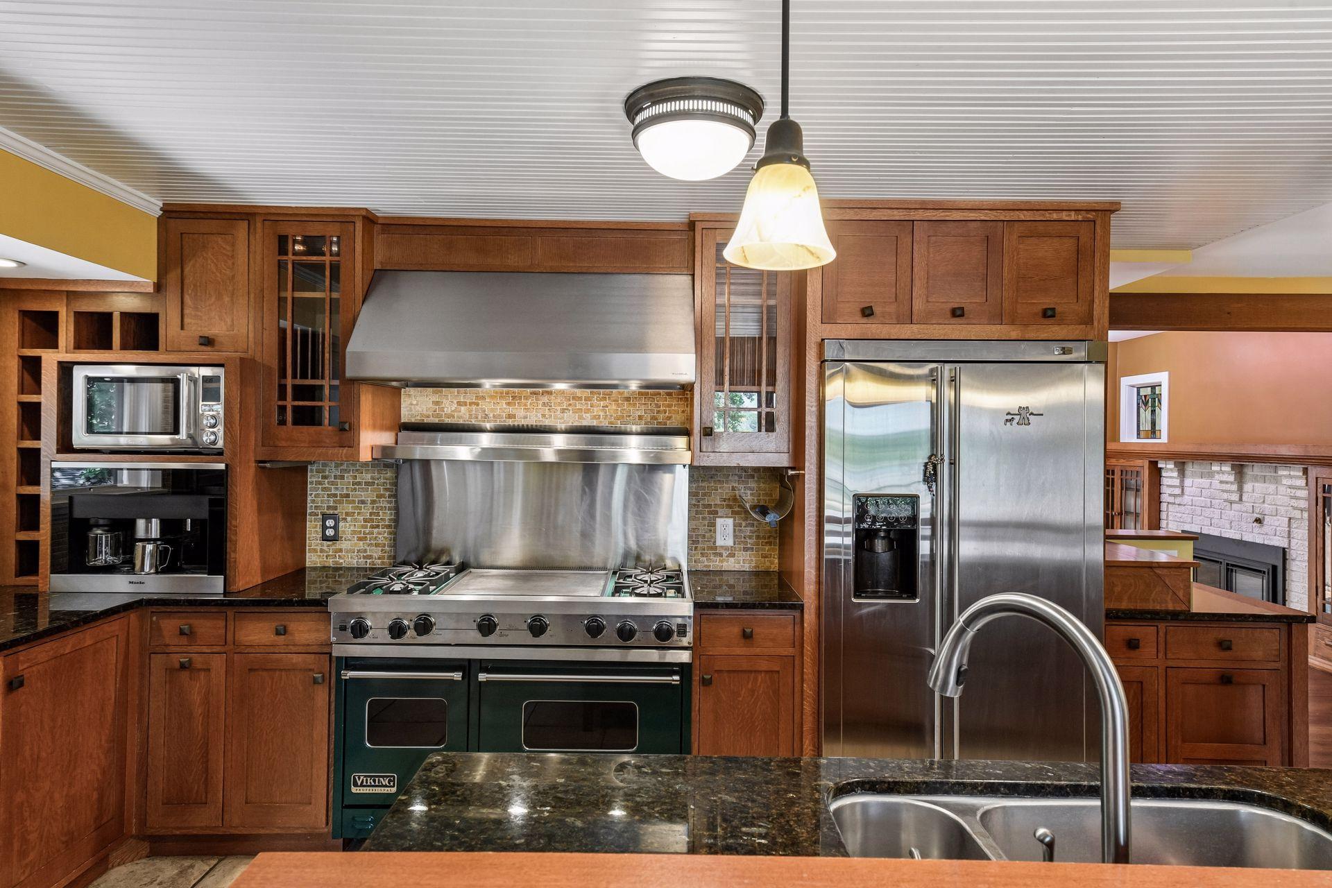 Spacious chef’s kitchen with professional-style appliances.