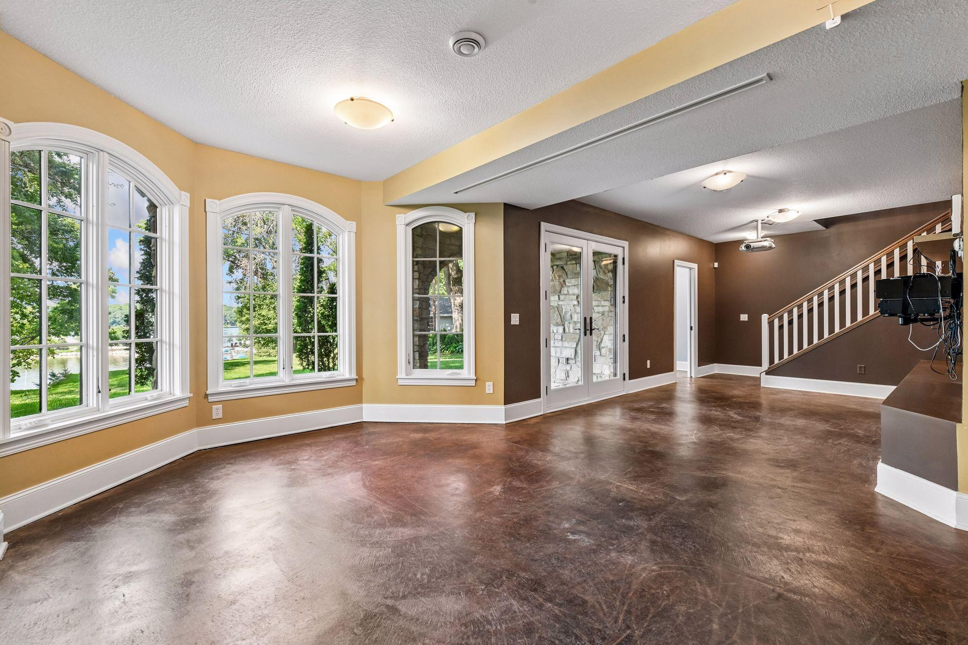 Finished walkout lower level with direct access toward the lake.