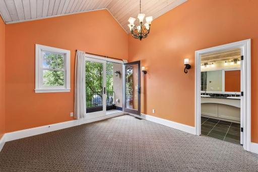 Actual upper level master suite with large walk in closet, huge bathroom and deck overlooking the lake.