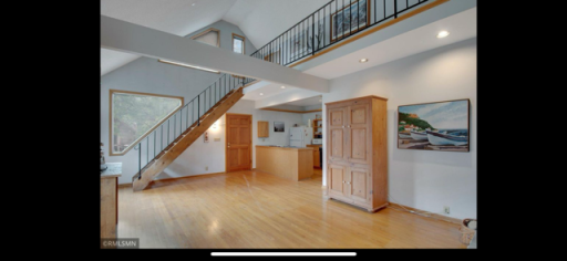 Second level looking at stairs to the lofted space