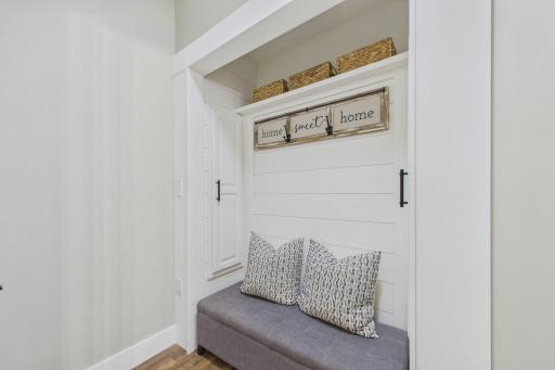 cute sitting/storage area at top of stairs