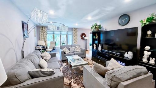 living space with sleek stylish lighting. Movie nights just got an upgrade.