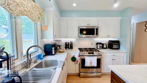 Bright white kitchen with clean, modern finishes